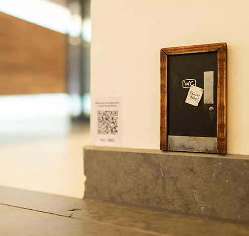Miniatures Model-making: Tiny public bathroom door exhibited in Bristol Cabot Circus shopping centre